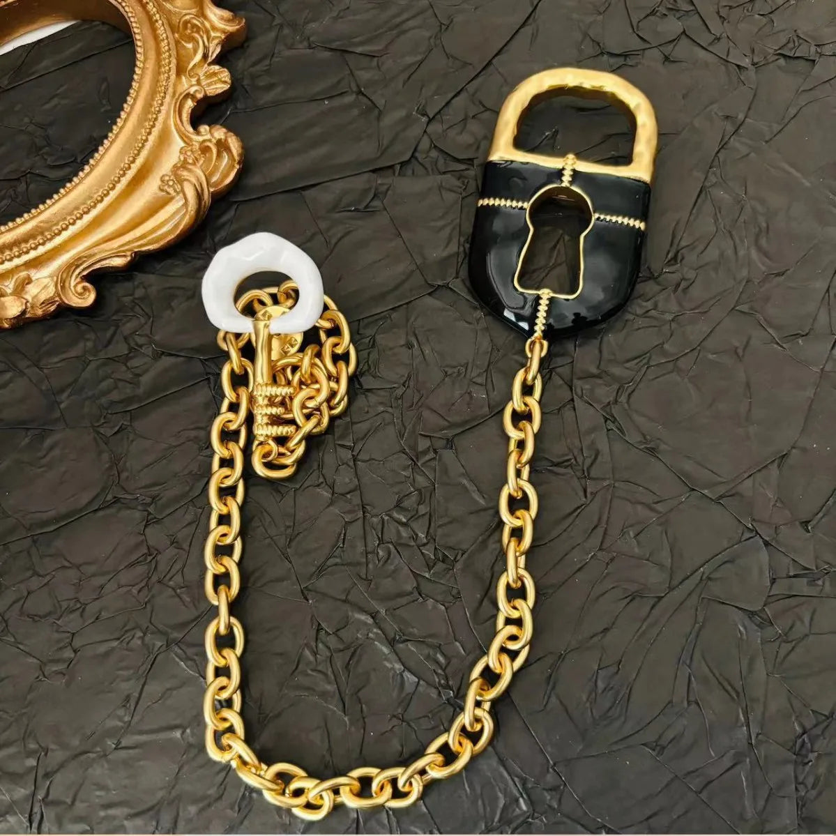 lock with chain brooch